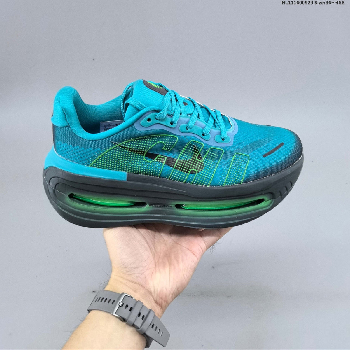 Nike Vomero Premium – Teal & Green