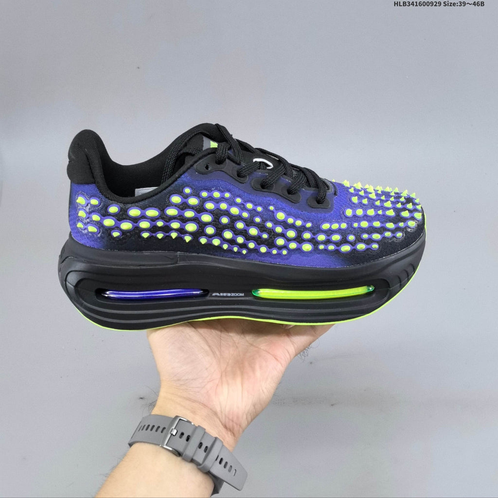 Nike Vomero Premium – Teal & Green